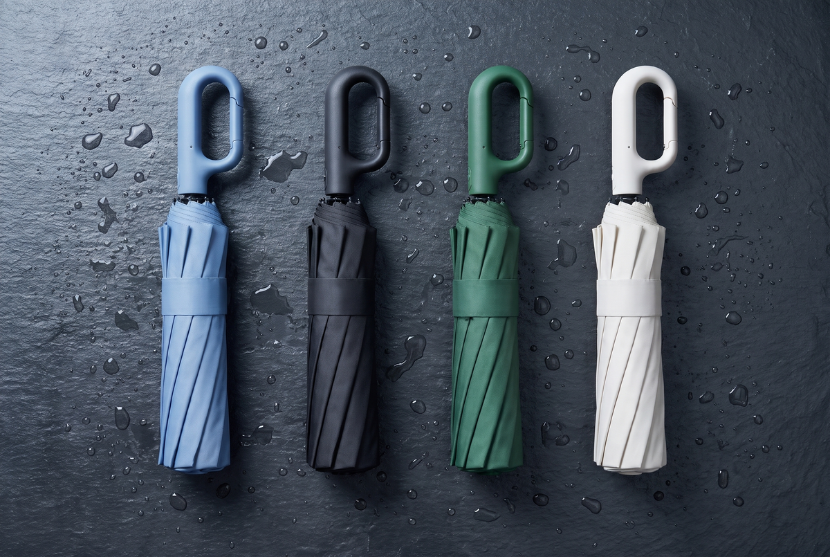 Puddlio umbrellas in powder blue, black, forest green and off-white
